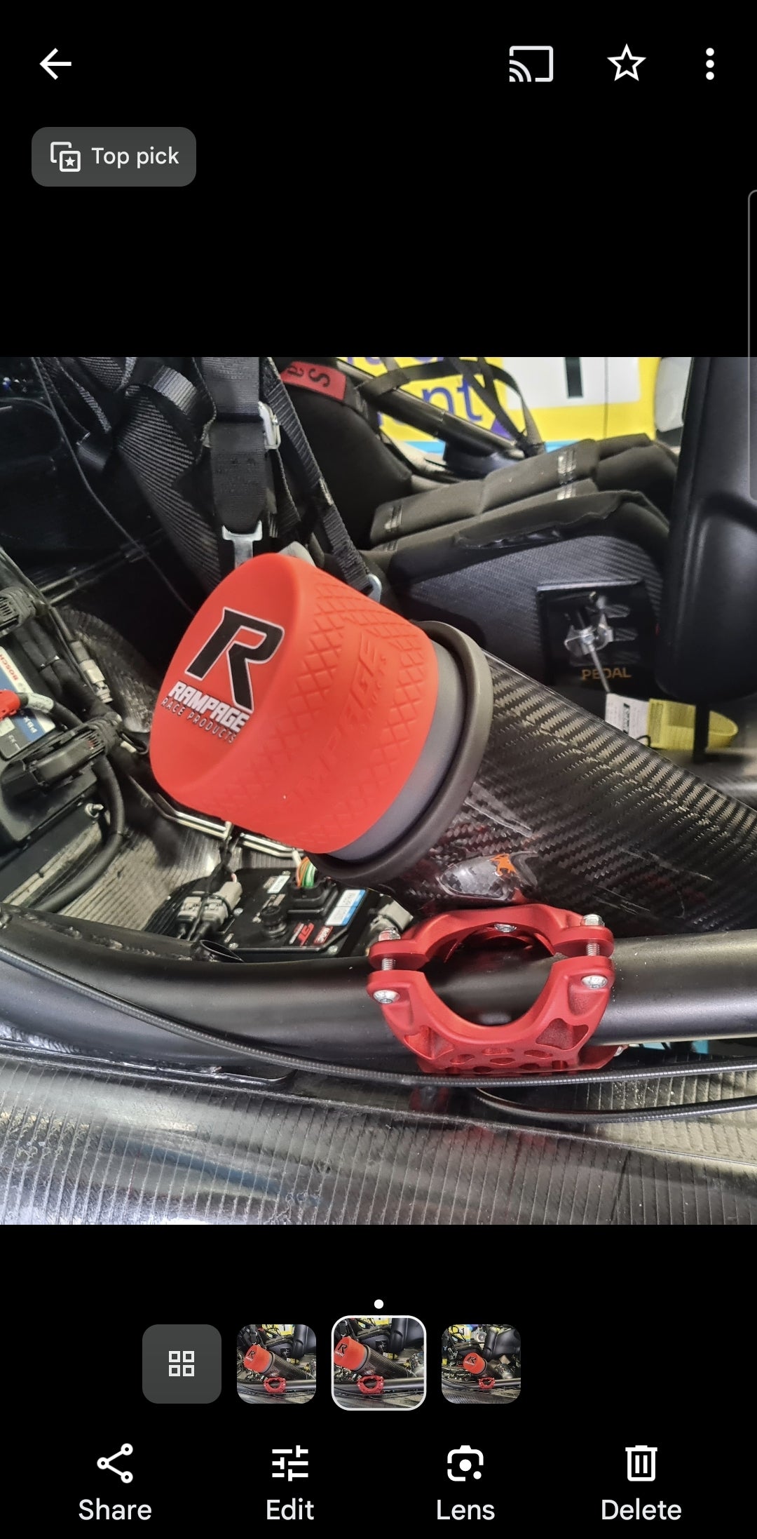 Ramhydrate drink bottle and Lid, black quick release dry break lid , double wall insulated bottles with Rampage logo shown in position in car