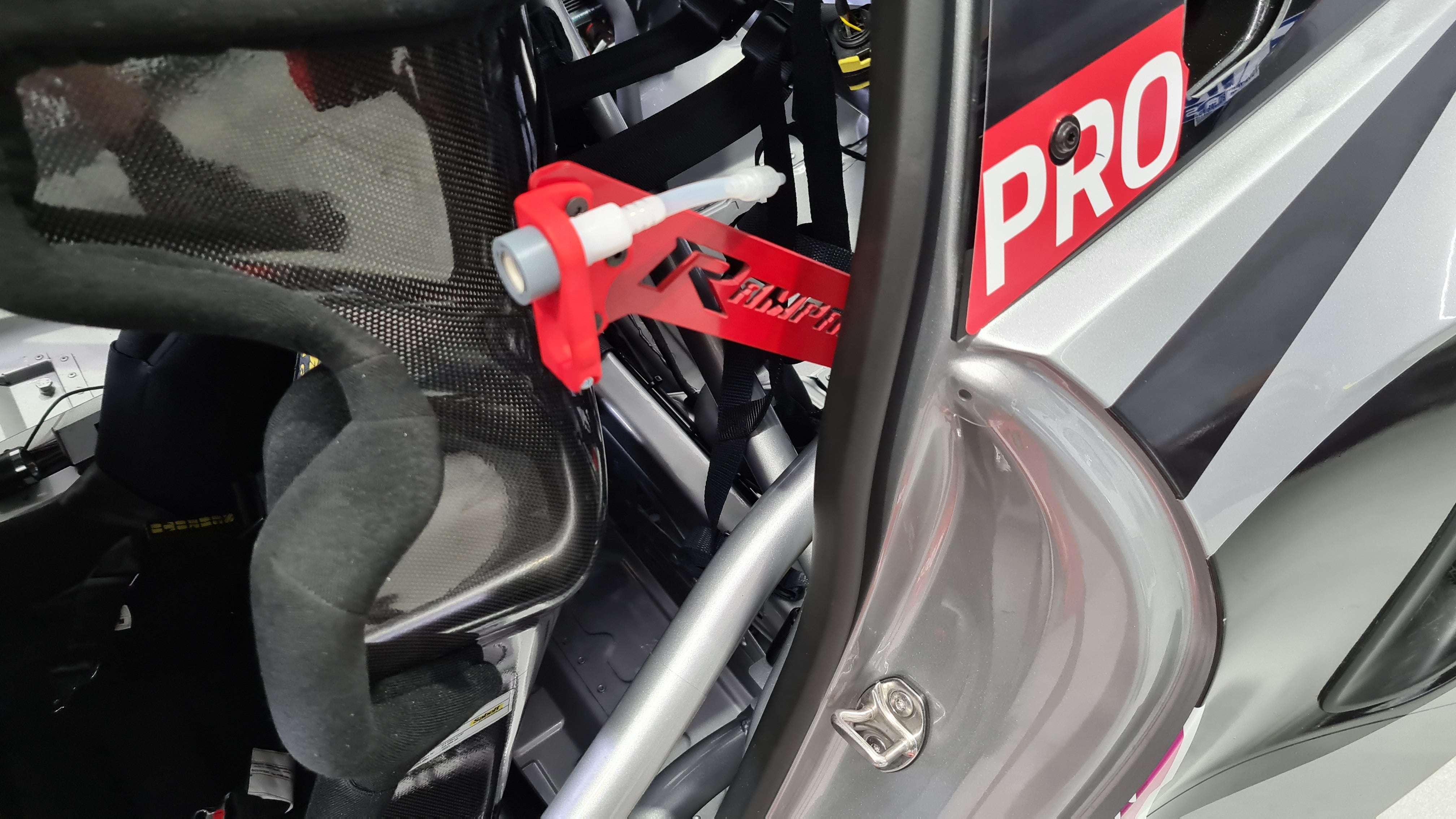 Porsche 992 , Carrera cup , 992 race car, 992 drink system, 992 quick connections, 12hr , 24hr, 6hr, enduro , drink system , quick connections , radio and drink fittings