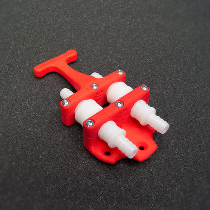 RamConnect cool suit kit components laid out - hoses, fittings and quick-change connectors